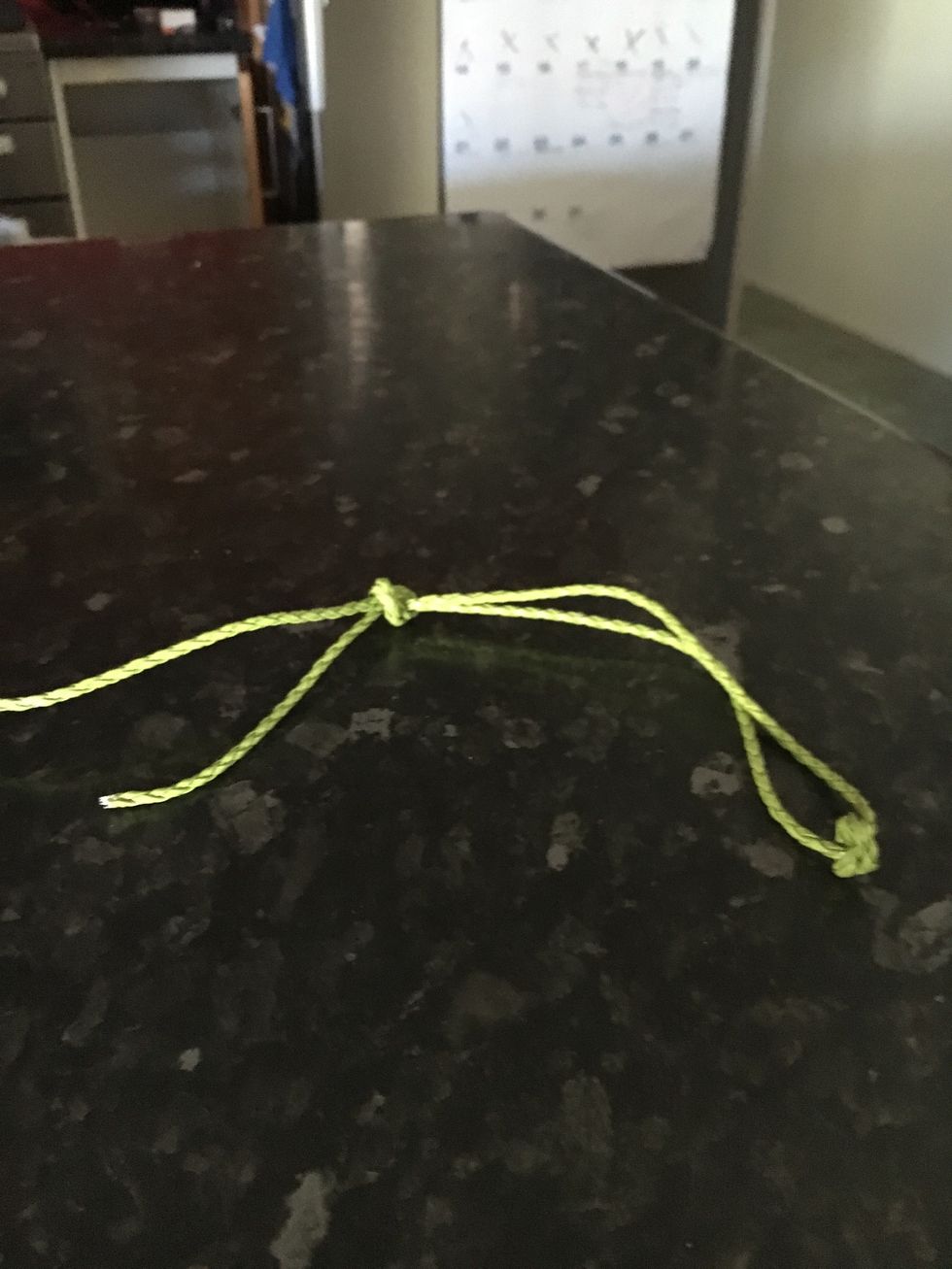 Remove the marketing label, and then glue 3mm green rope from the top to about a quarter way down.