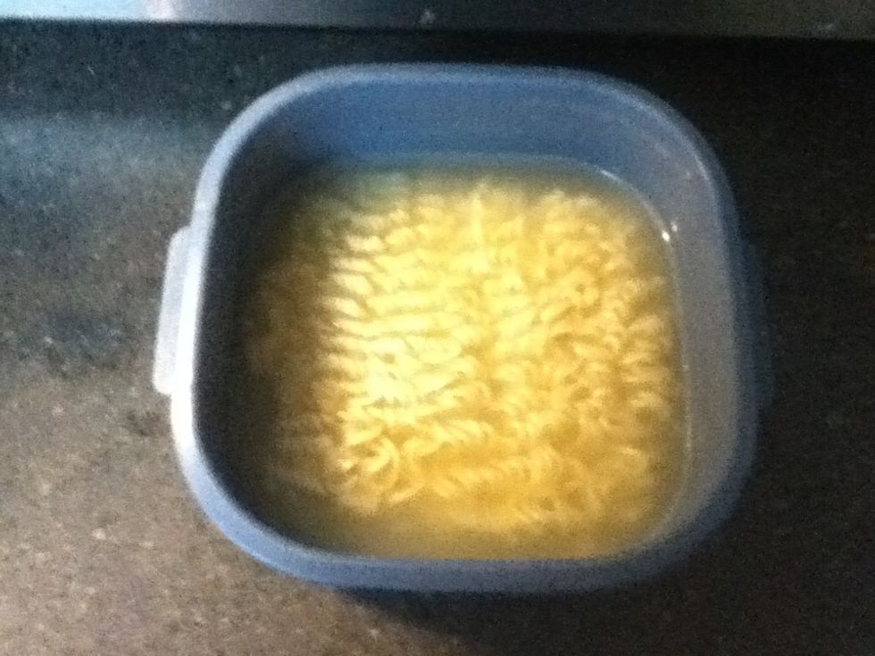 Remove the noodles and make sure they are fully cooked by trying a noodle