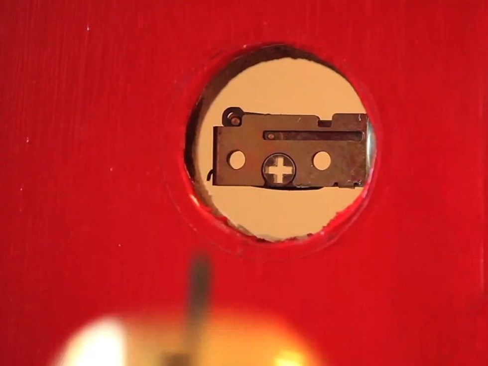 Remove the old latch.