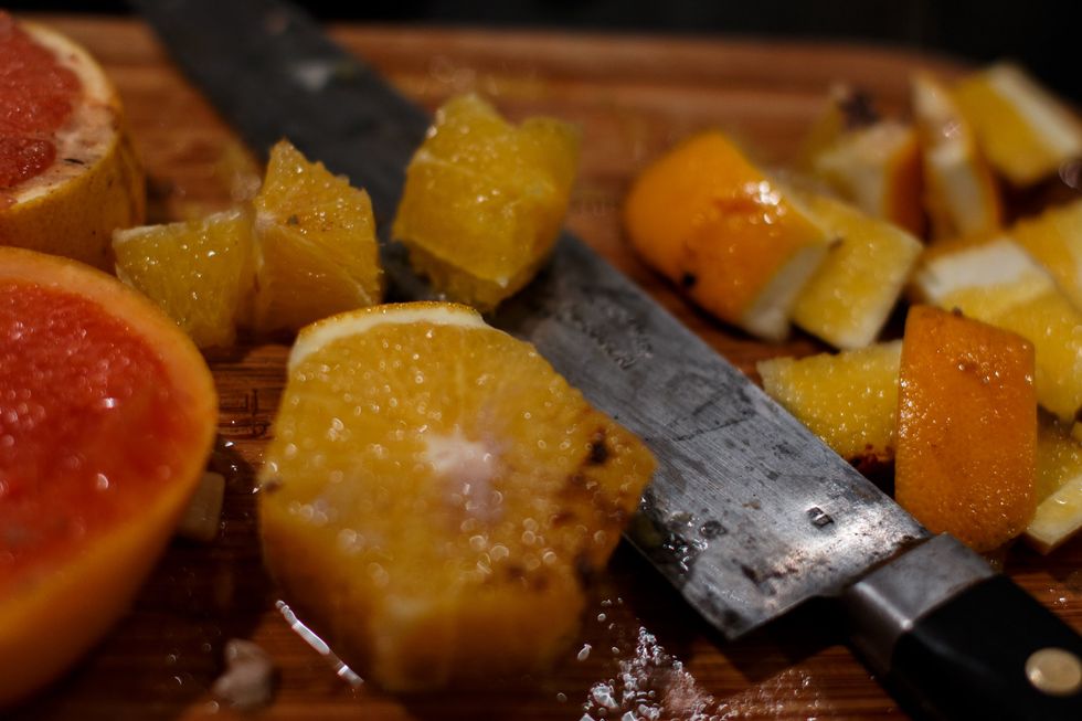 Remove the outer peel and cube the citrus.