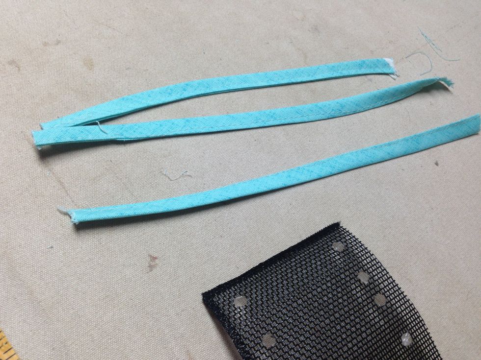 Remove the paper from the folded selvage of  the 11\u201d utensil strips and press - then top stitch.