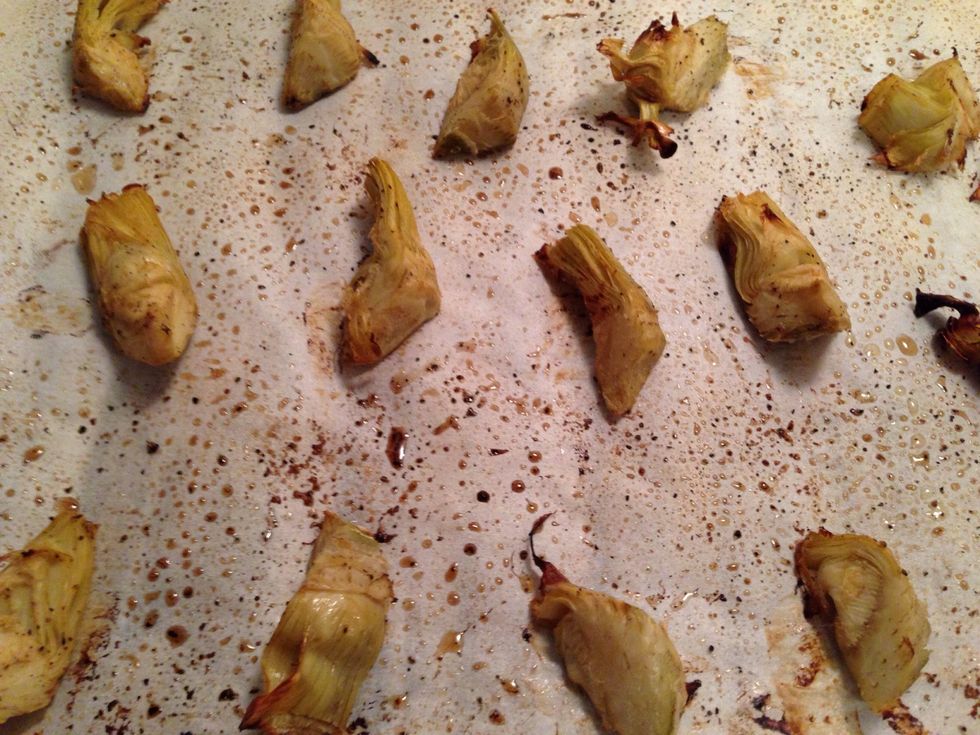 Remove the roasted artichokes from the oven.