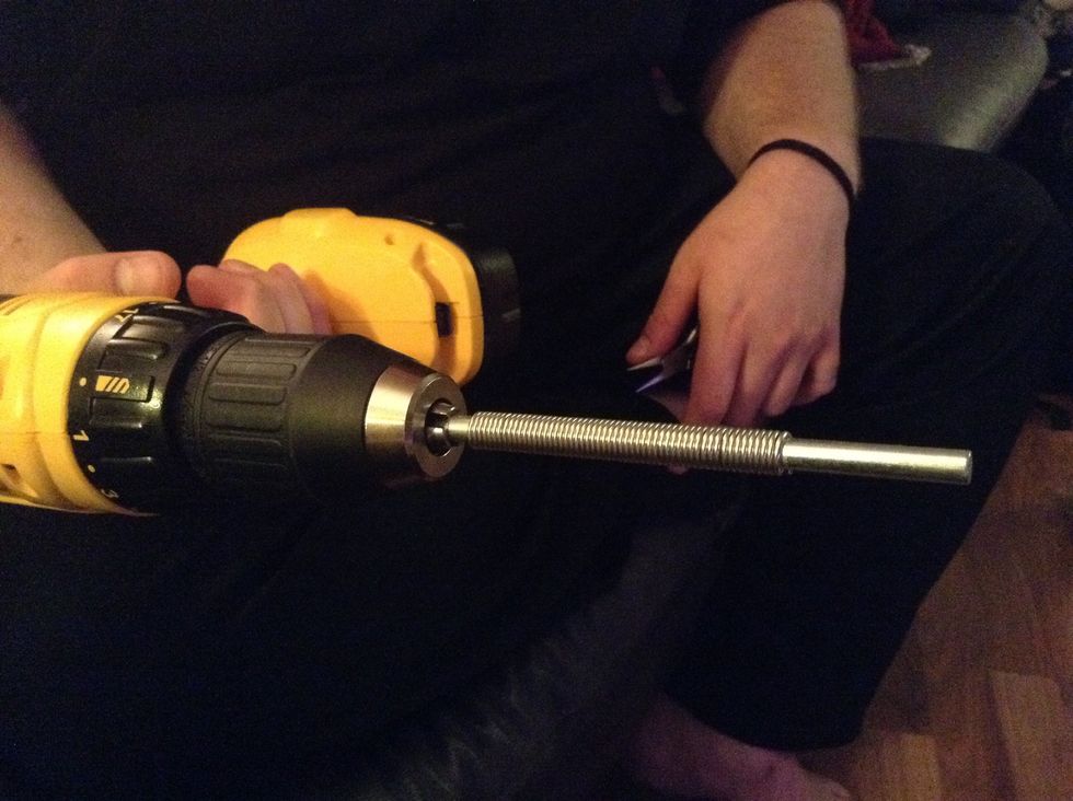 Remove the rod from the drill by twisting the drill bit adjuster and pulling out by the rod.