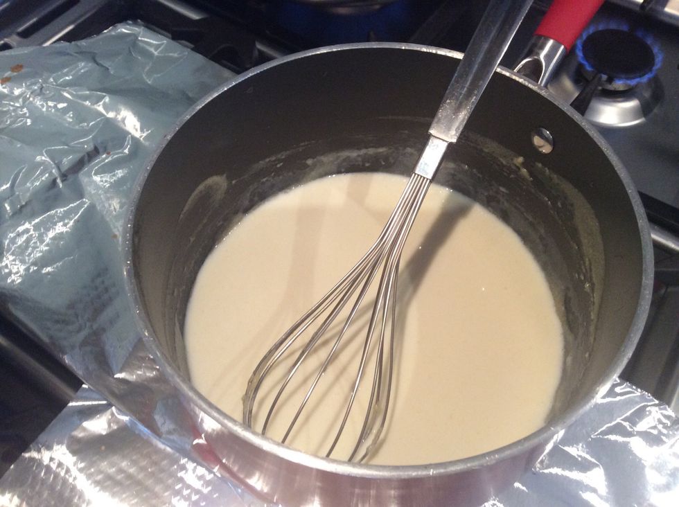 Remove the saucepan from heat and add milk slowly whilst whisking until mixture is smooth.