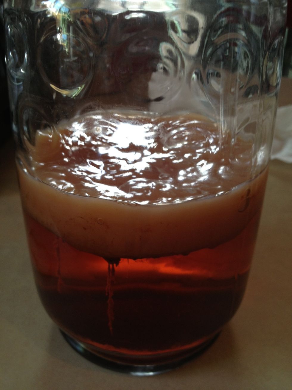 Remove the scoby (top layer, it should feel firm)