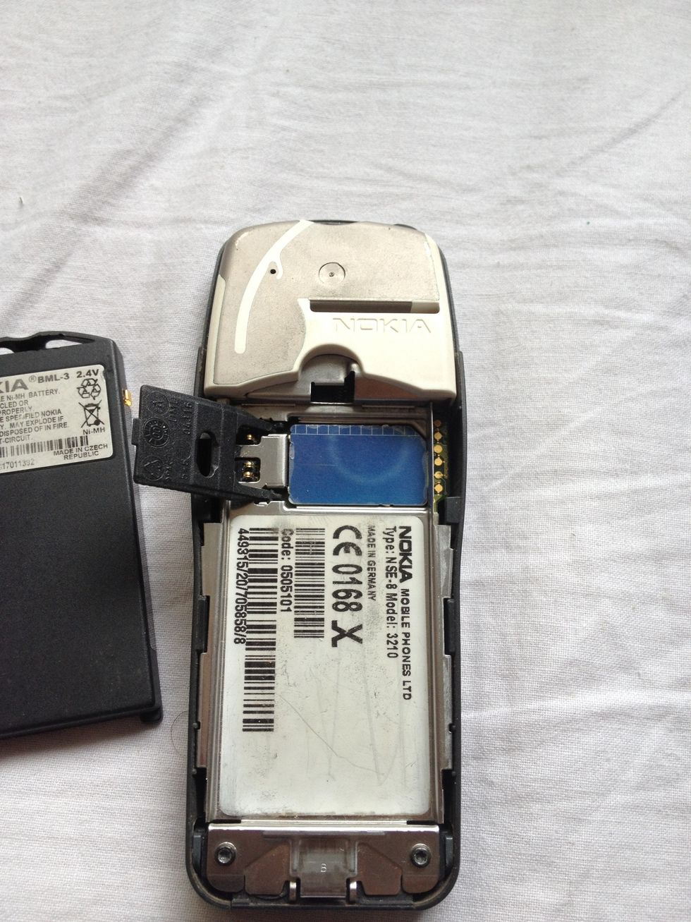 Remove the sim card from the sim card slot.