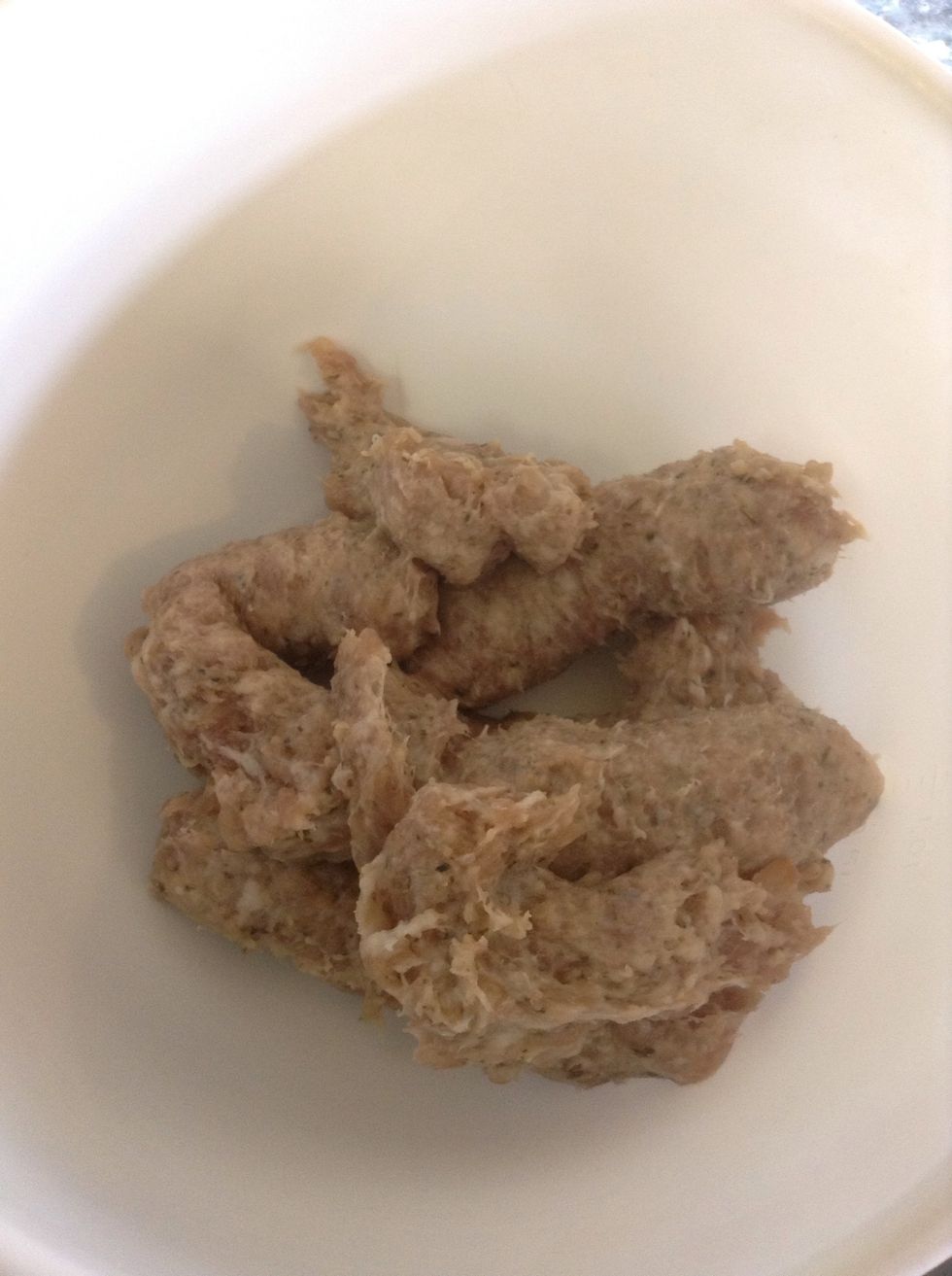 Remove the skin from the sausages and add to a bowl