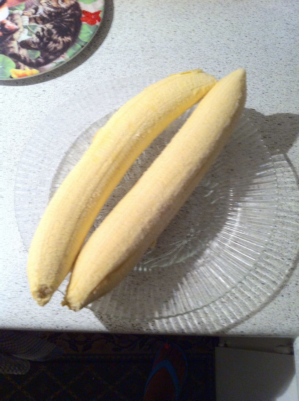 Remove the skin. Not like a banana but the opposite way