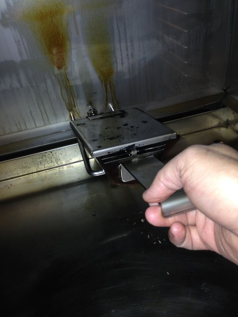 Remove the smoker box from the smoker.