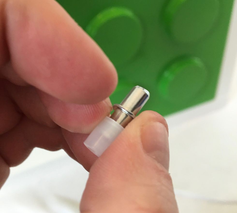 Remove the spacer washer from the plug