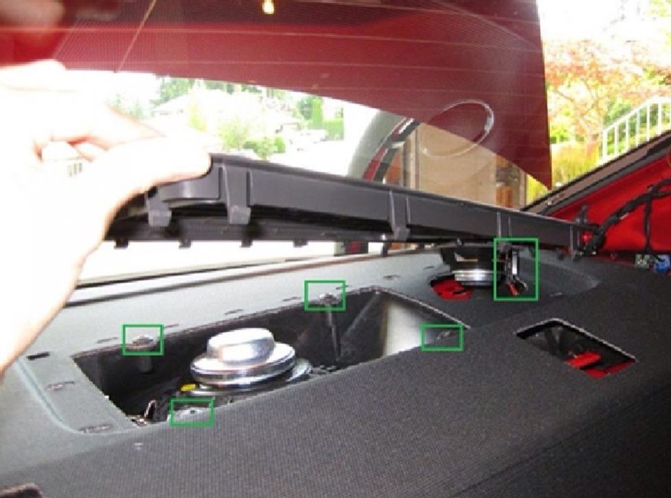 Remove the speaker wire from the tweeter (small speaker). Remove the 4 Torx screws holding the deck cover to the subwoofer housing.