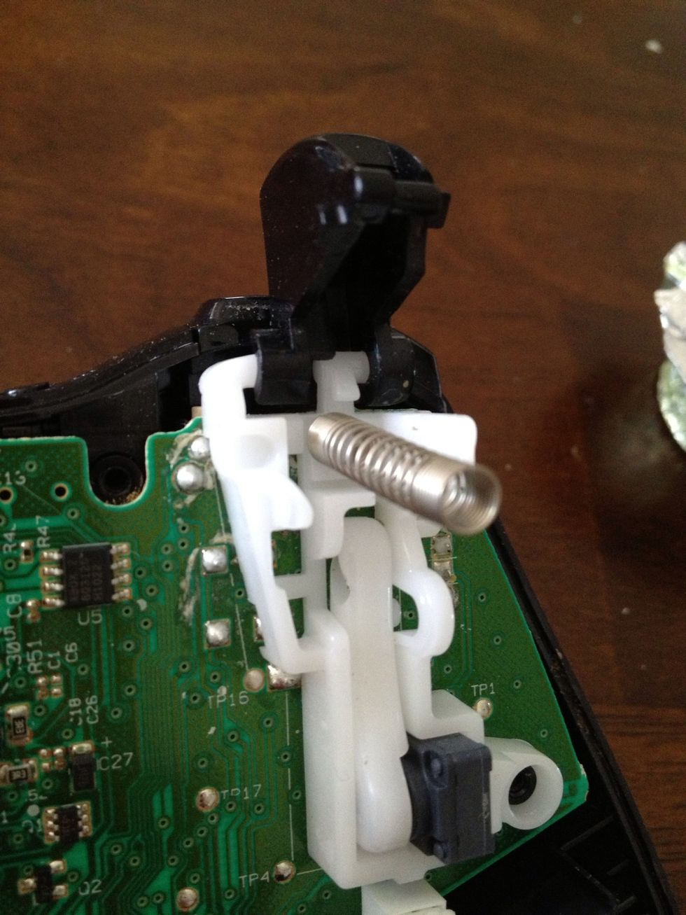 Remove the spring if you haven't already.