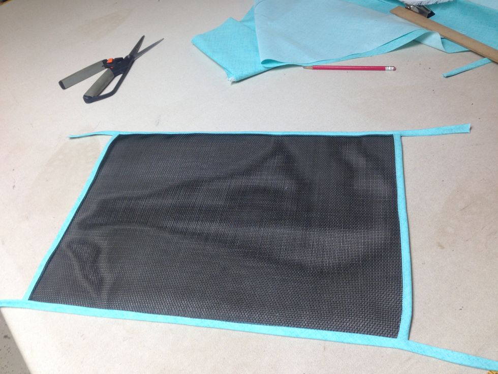 Remove the SteamASeam2 paper from 28" strips.  Center band on 18\u201d sides of place mat so that the banding extends beyond the edge of the placemat on each end as shown.  Apply as previously done.