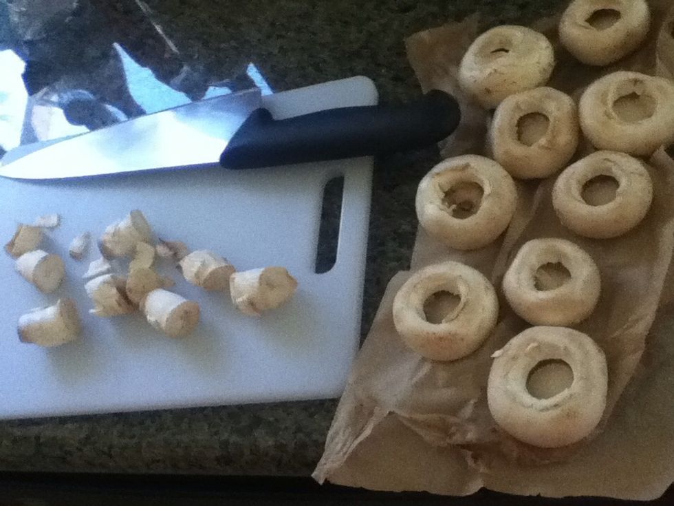 Remove the stems. Just push the stem to the side and you would hear the snapping sound and it should come off pretty easy. It helped me watching a video on YouTube. Type "how to remove mushroom stem".