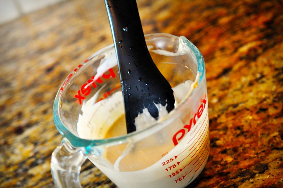 Remove the strainer and press the tea leaves to get as much cream out as possible before discarding the tea leaves. You should have approximately half a cup of cream left. Set the cream aside.