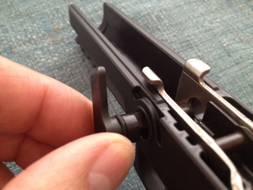 Remove the takedown lever (turn and pull simultaneously).