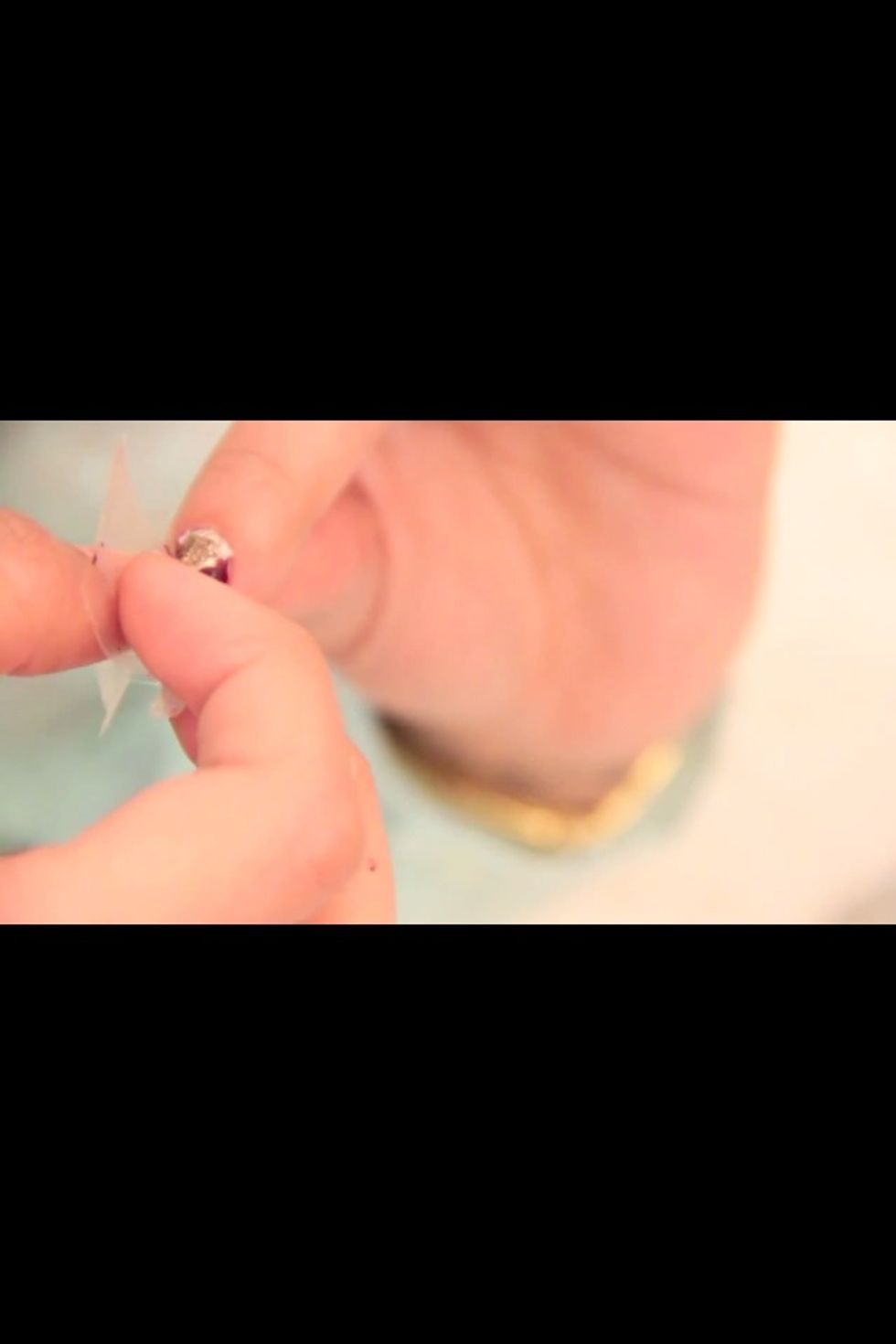 Remove the tape and finally put shine in your nails (at each step always waits for dry thoroughly)