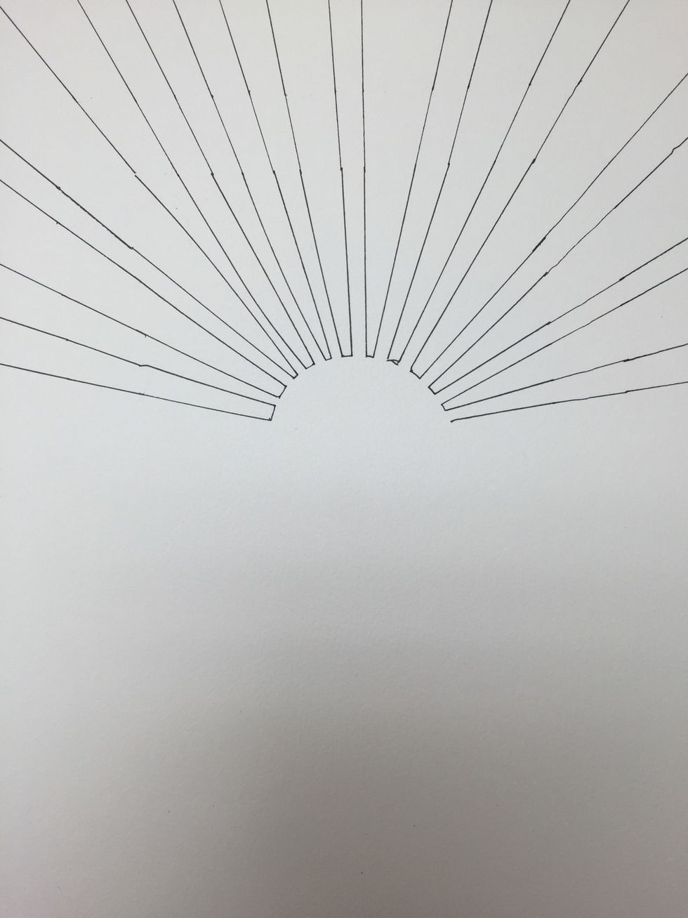 Remove the tape and use a ruler to connect the rays