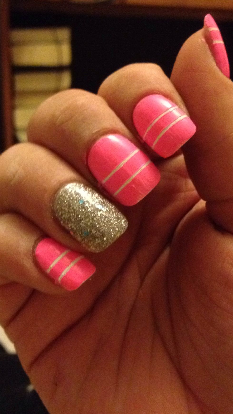 Remove the tape when the pink polish is almost dry, but not completely.