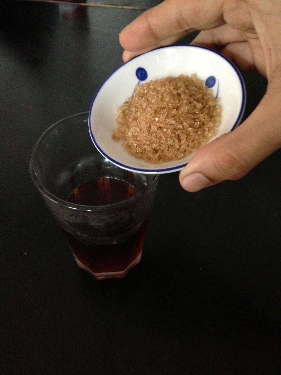 Remove the tea bags, squeezing them of its remaining contents. After which add the sugar. Do note that if you leave the tea for too long, it gets bitter and that white sugar is sweeter than brown.