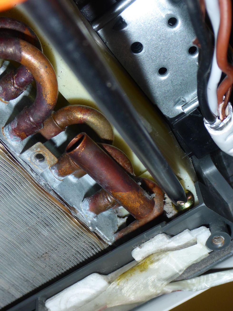 Remove this crossfan assembly screw.