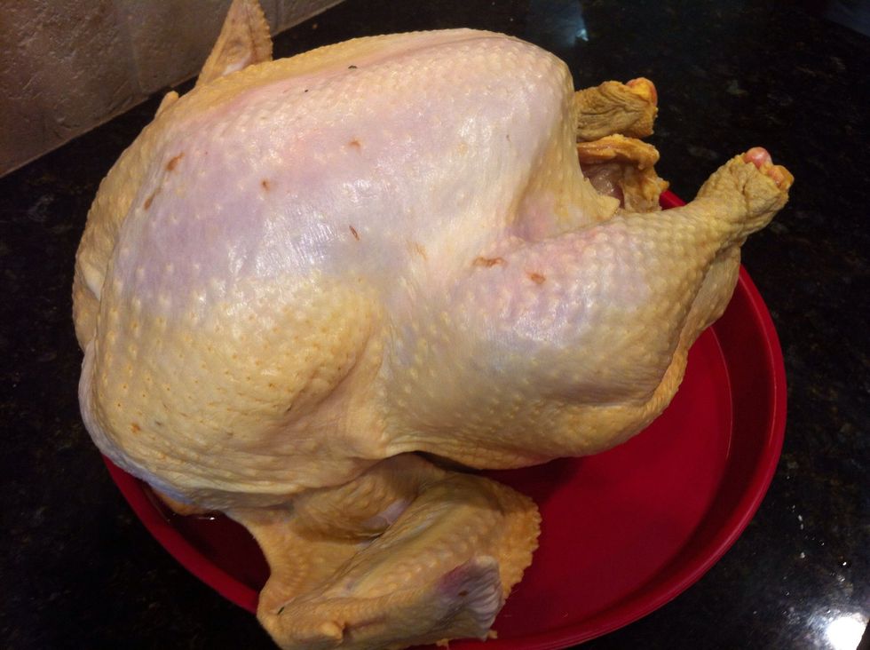 Remove turkey from brine and pat dry w/ paper towels. Coat entire bird w/ vegetable oil, salt and cracked black pepper.