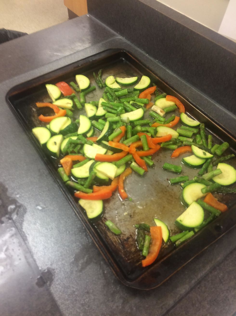 Remove veggies from oven, strain noodles