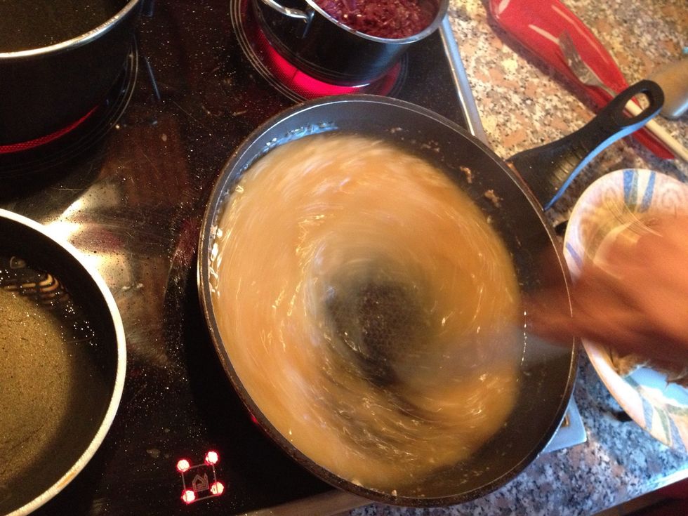 Remove your meat from pan... Add your gravy (flour, salt, pepper, a little cold water)... Stir! No lumps!