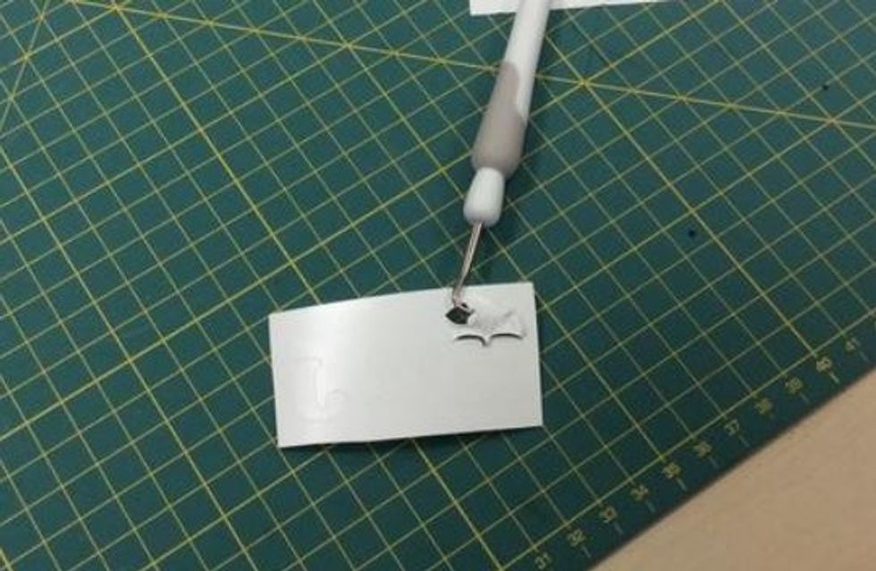 Rensa bort all vinyl runt din bild.