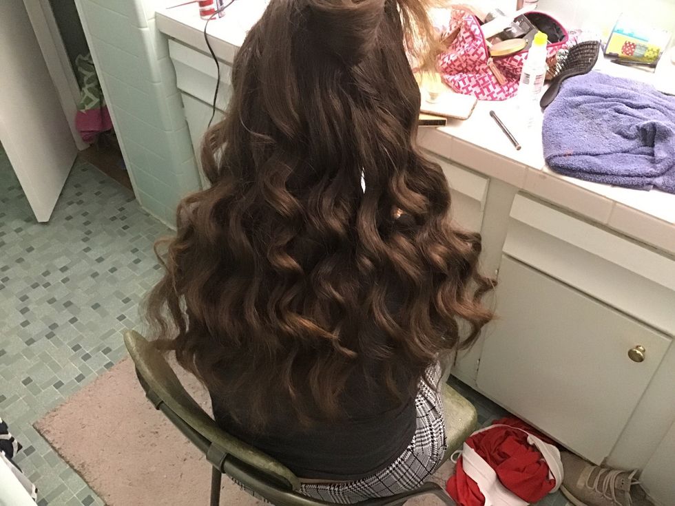 Repeat all of these steps 3 times, and keep letting hair out.