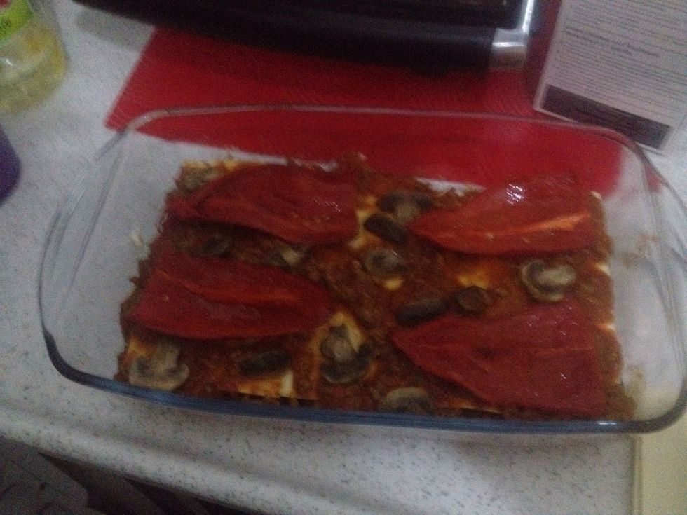 Repeat Another layer of pasta sheets with mince and more vegetables