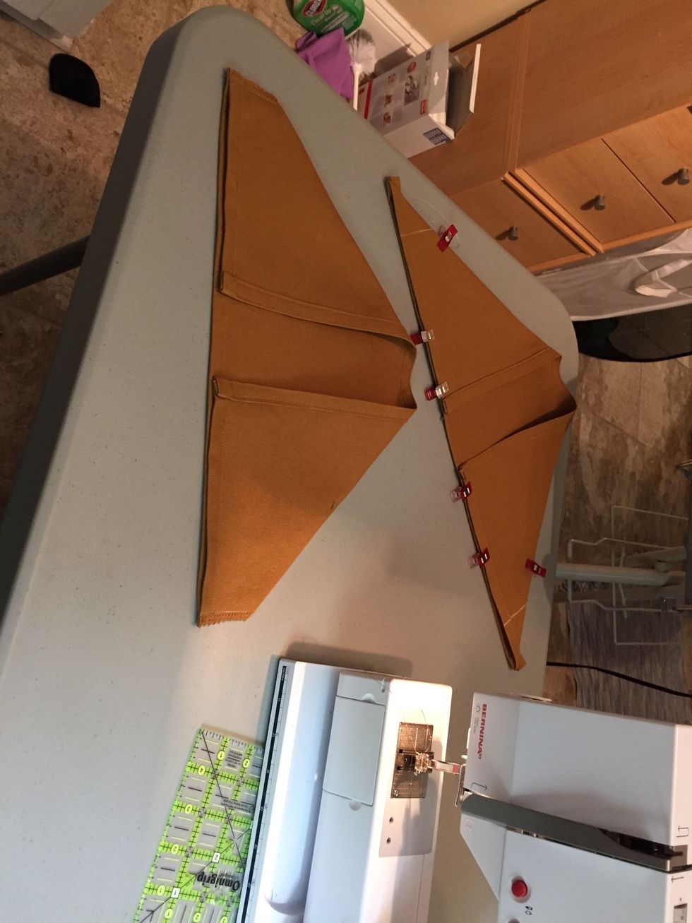 Repeat folding, measuring 2", stitching, and trimming (steps) on other side.