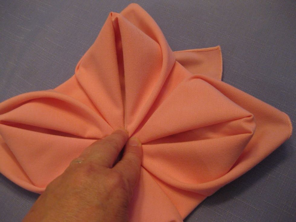 Repeat for all four corners. After this step, your flower petals should be formed.