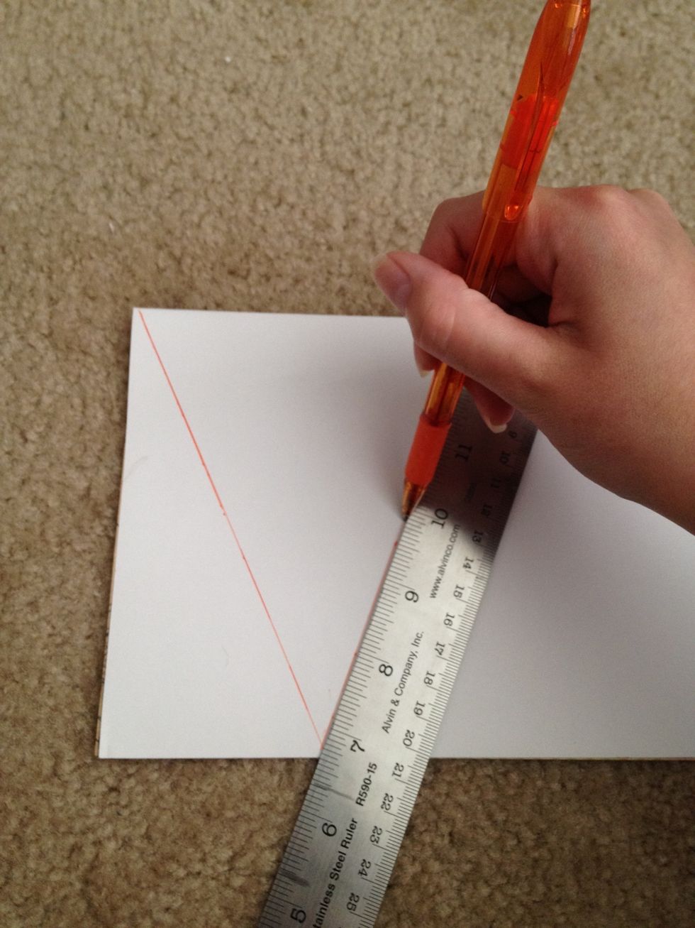 Repeat for the other side to complete your triangle and repeat across the paper.