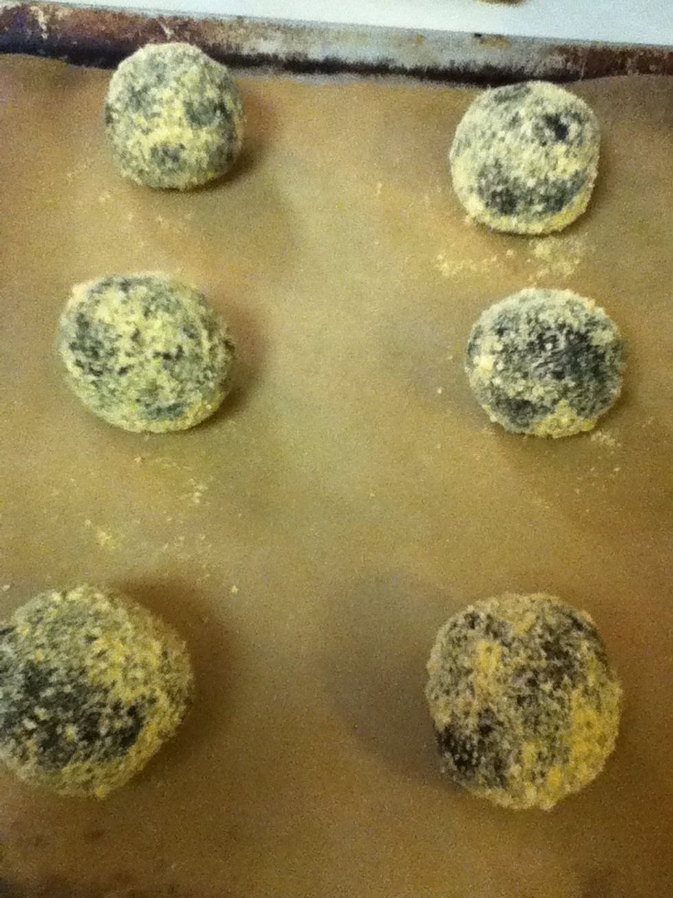 Repeat for the rest of the dough and place balls onto a baking sheet lined with parchment paper.