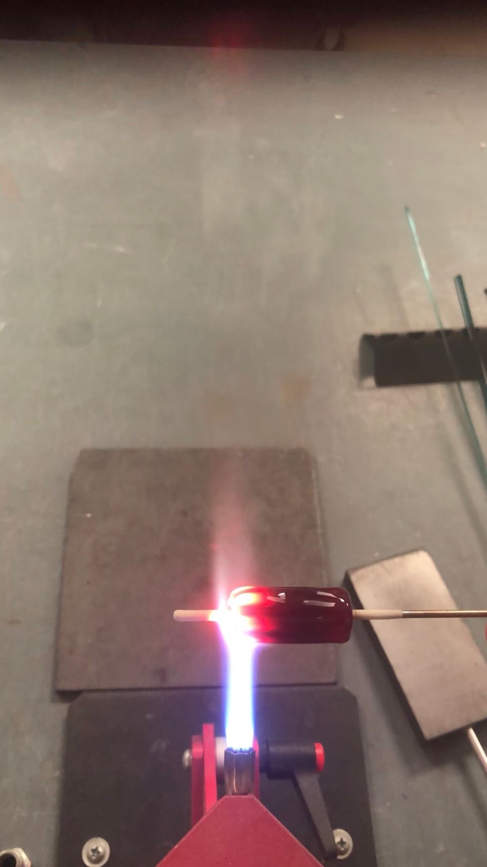 Repeat on the opposite end. Heat the end.