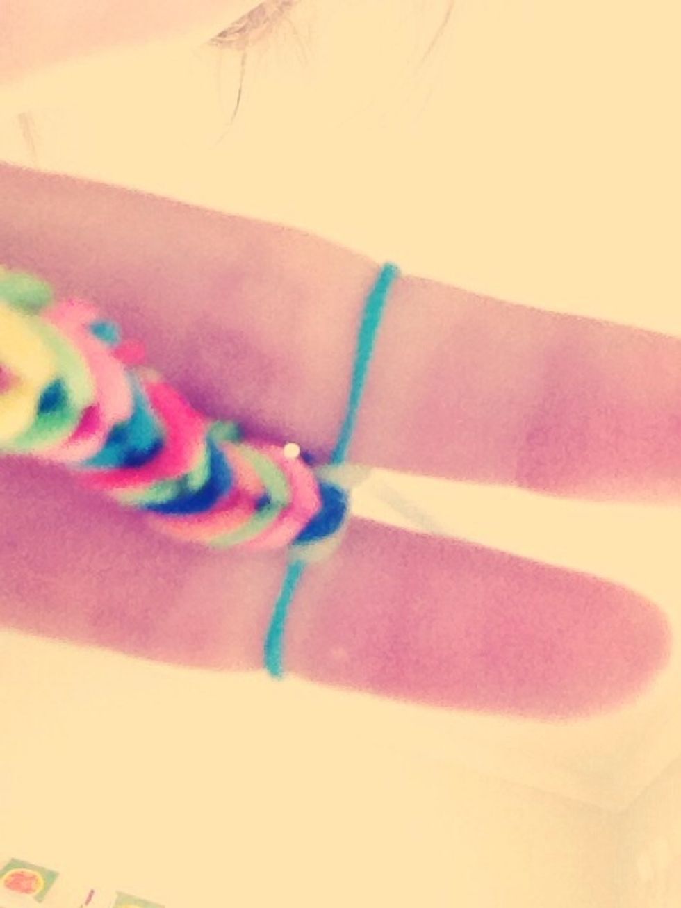 Repeat on the other side so there is now only one band left.