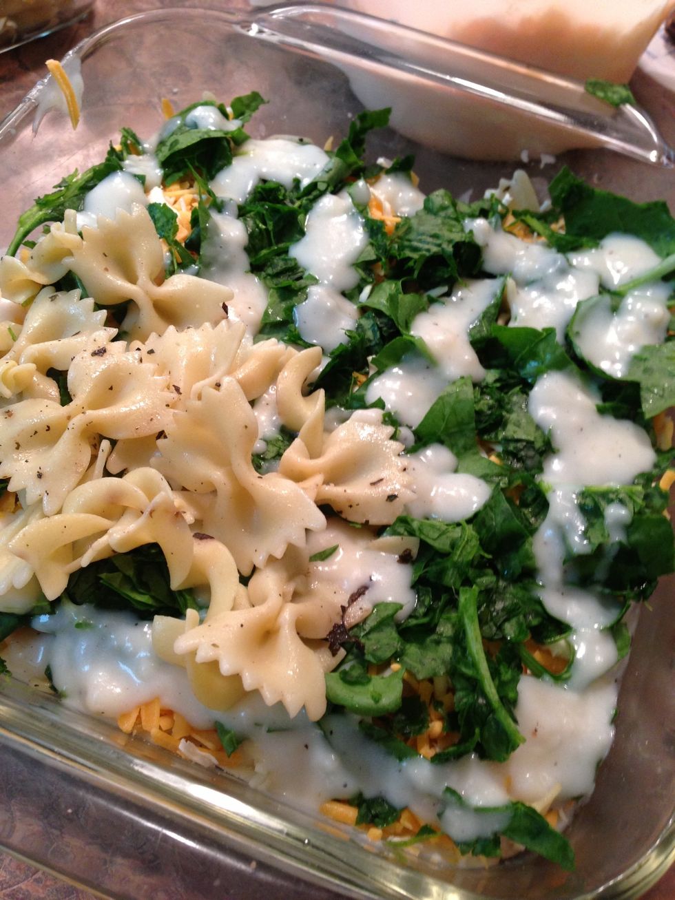Repeat pasta, cheese, spinach, sauce and top with fairly solid layer of cheese.