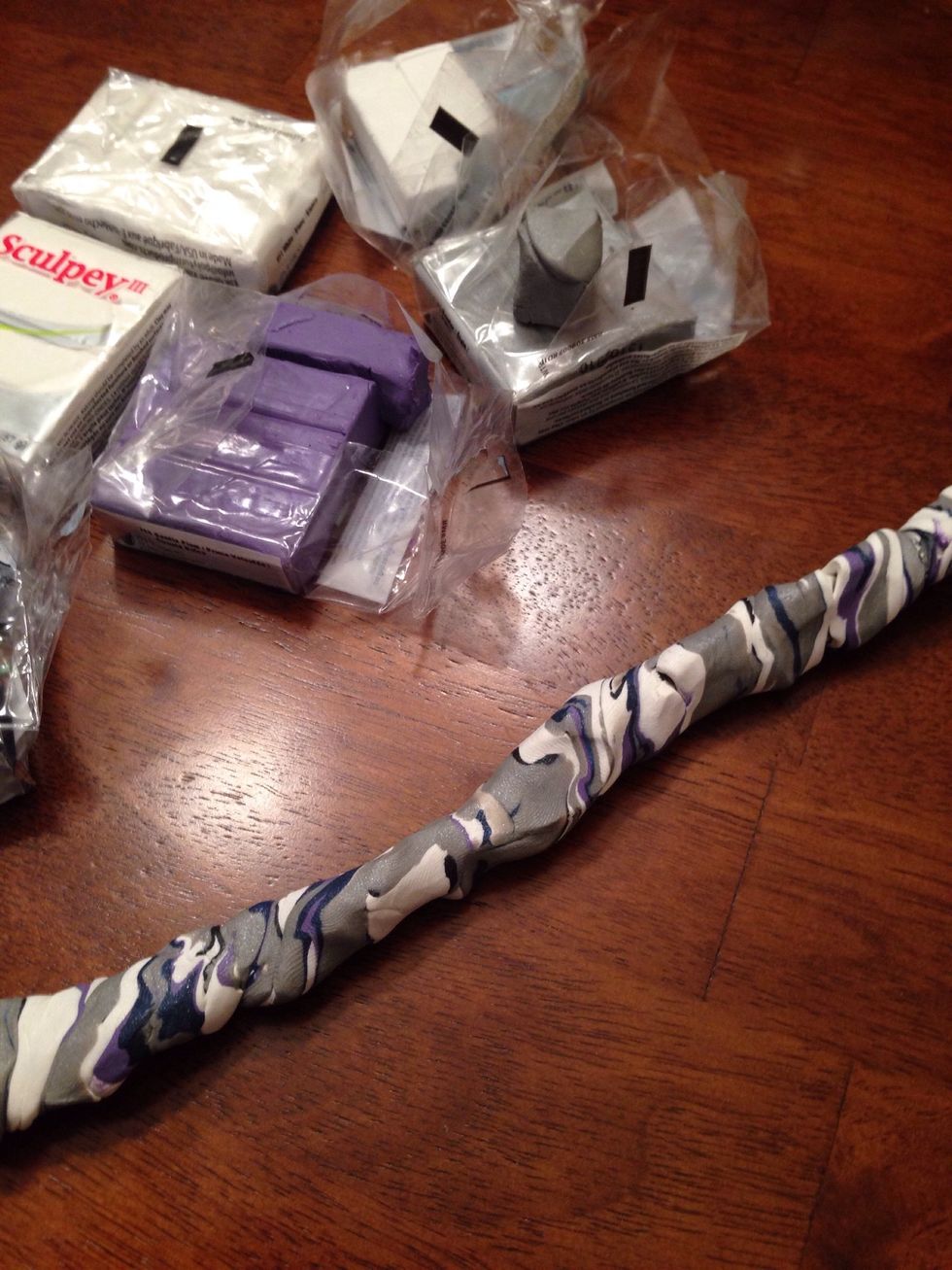 Repeat process 2 to 3 times making sure to always have a roll and never scrunch your 10" roll into a ball. Colors will start blending to make its "marbled" look.