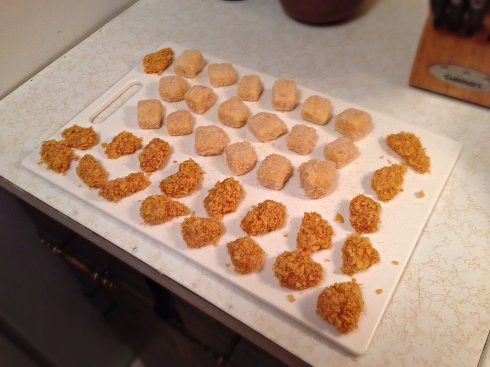 Repeat same steps with the chicken, breading it in corn flakes. Make sure you put salt on the chicken before you put it in flour. Chicken only needs one coat :) All ready to get fried!