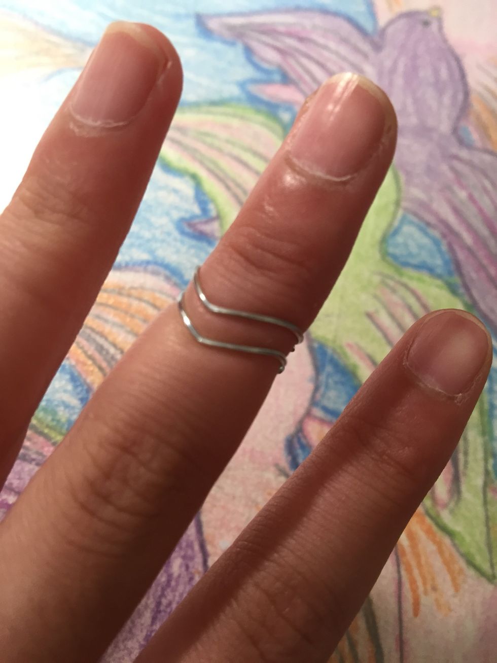 Repeat step 6 through 8 to make another one and you are ready to wear your DIY wire knuckle rings