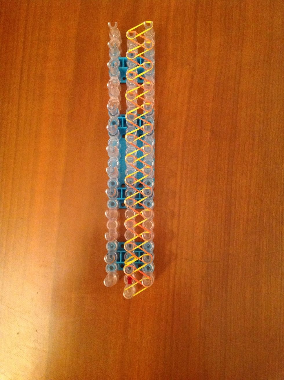 Repeat step four until you come to the end of the loom. ( only put rubber bands on two rows of the loom )