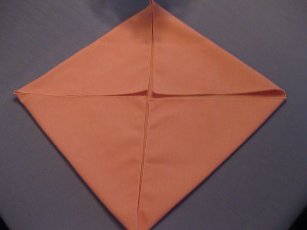 Repeat step two for all four corners of the napkin
