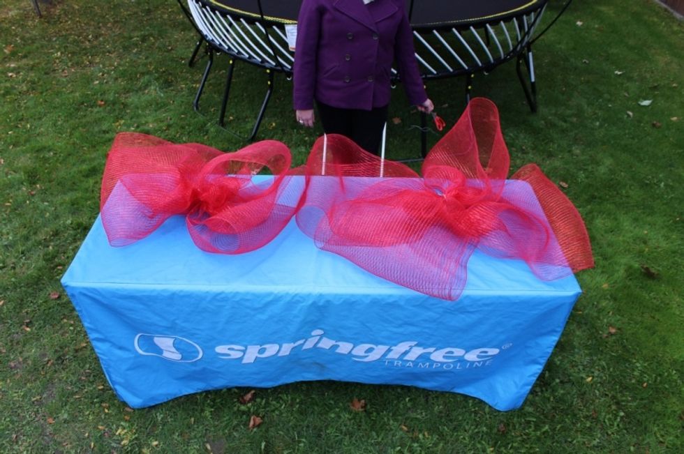 Repeat steps 3 to 6 with your 8ft (2m) pieces of ribbon.  You will now have two bows.