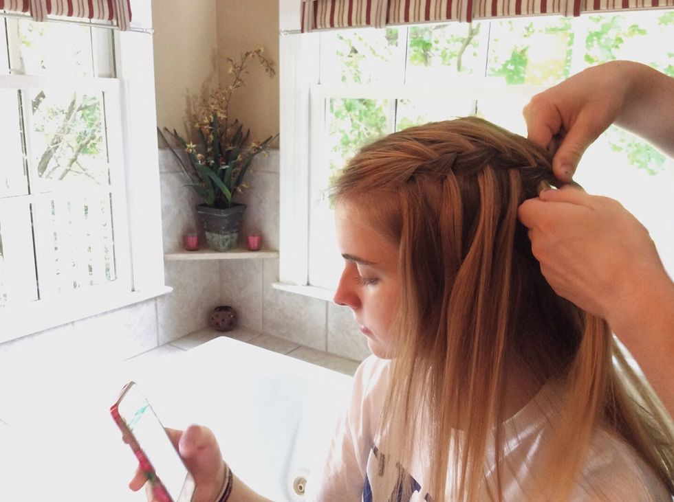 Repeat steps 4-7, until the waterfall braid has reached the back of your head.