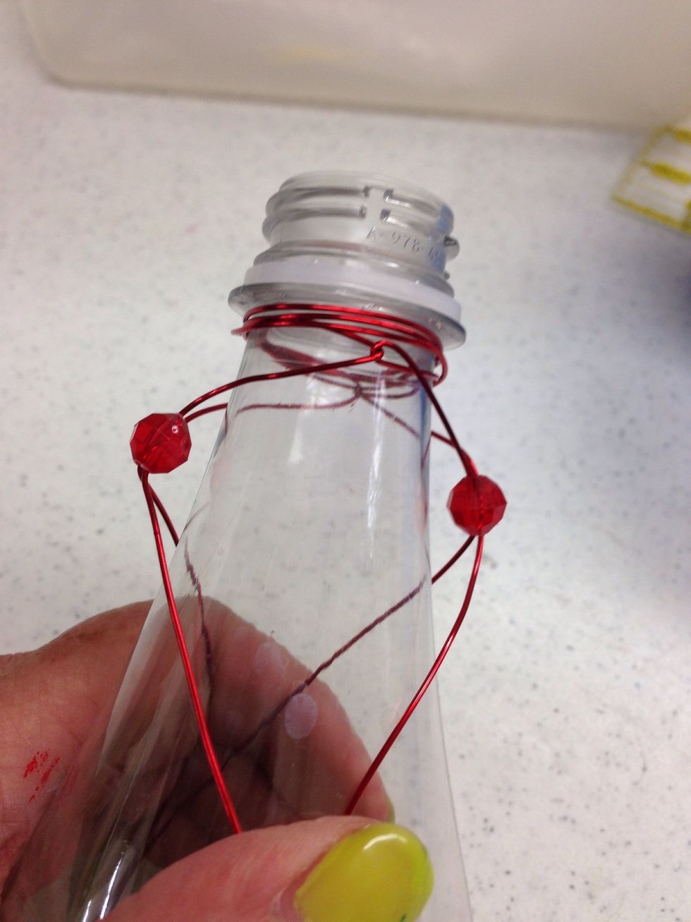 Repeat steps eight through ten with the remaining wires on the bottle.
