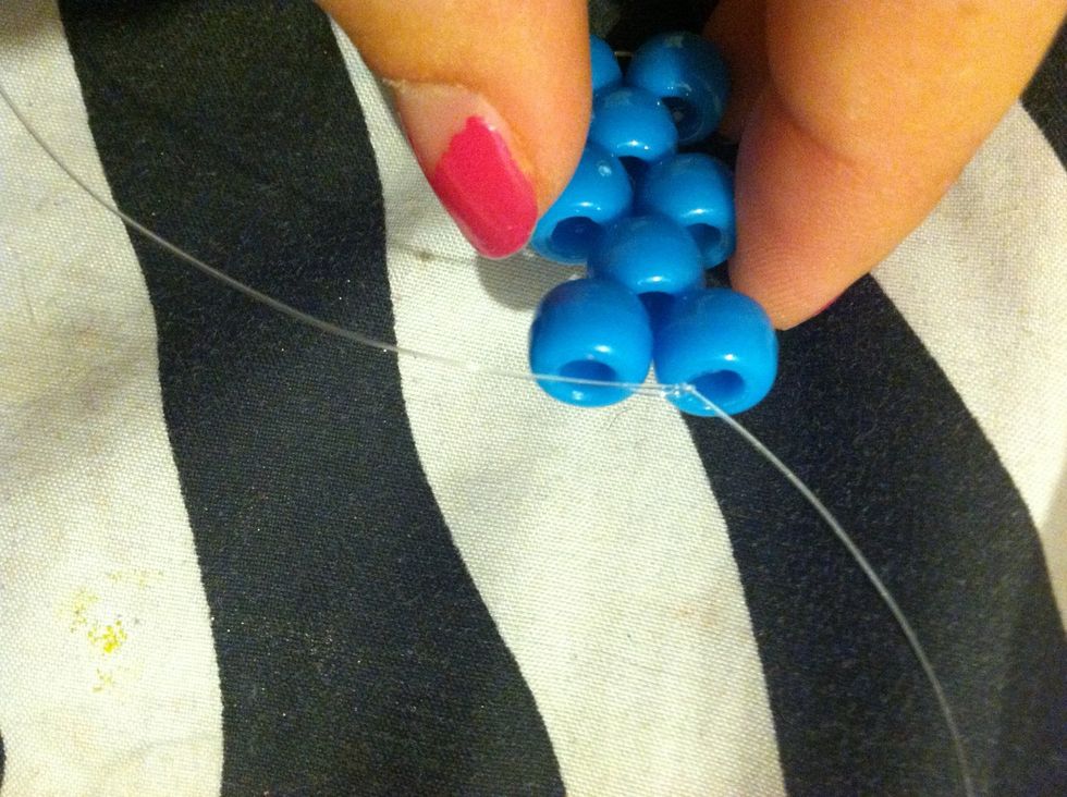 Repeat That 1 More Time With The One Bead And Then again With the Two Beads . After That Tie It Off With A Few Simple Knots .