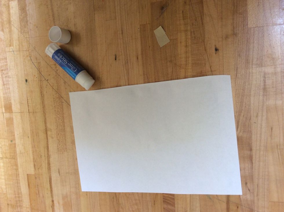 Repeat the glue step for the back of your cover.  Use your glue stick to put glue on the paper (around the edges and diagonally from corner to corner).