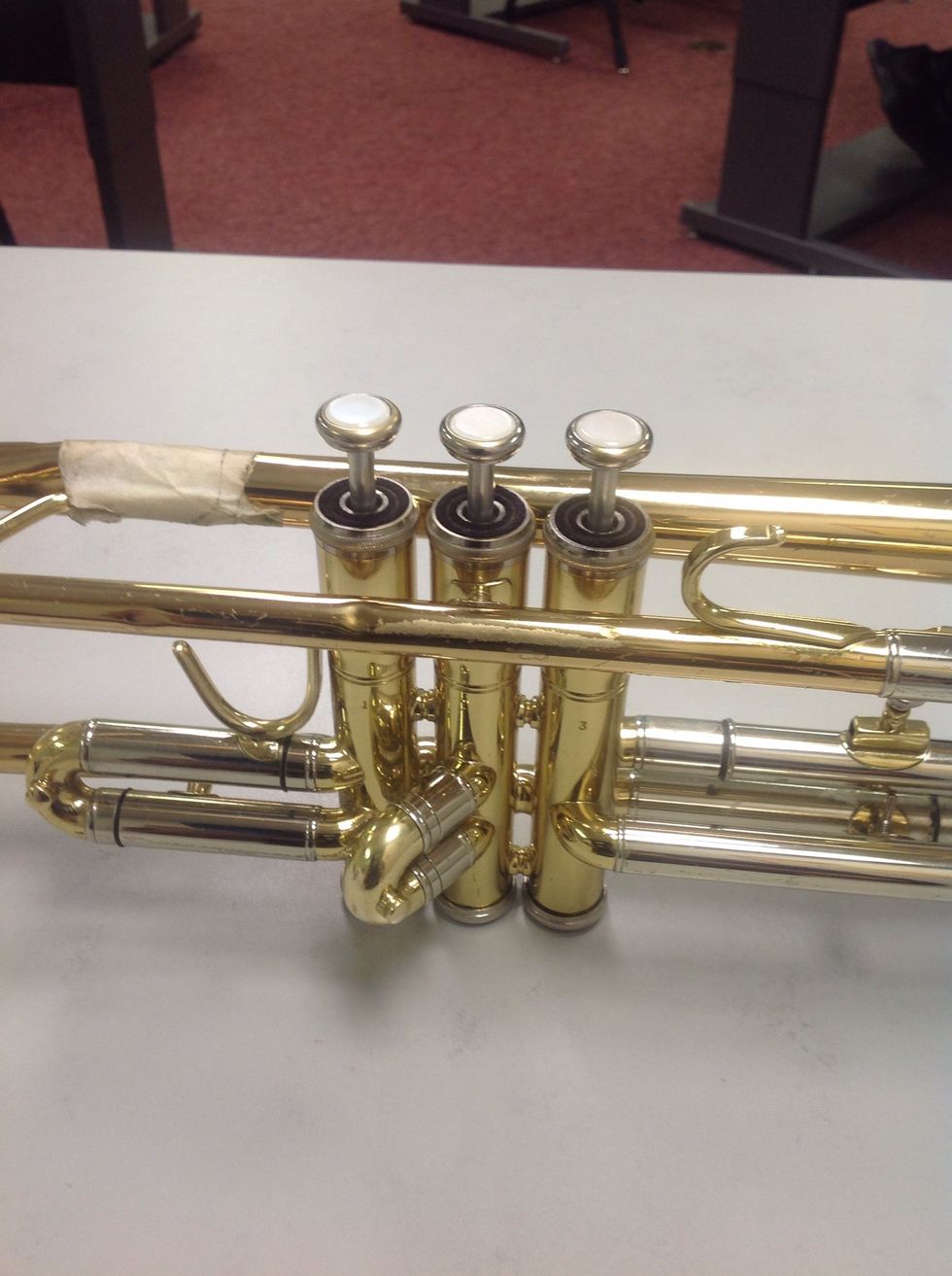 Repeat the process for the rest of the valves. Be careful NOT to over thread the screw cap! Doing so will result in the trumpet not functioning correctly when playing notes.