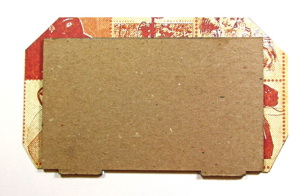 Repeat the process with the larger holder divider, using G45 Communique paper.